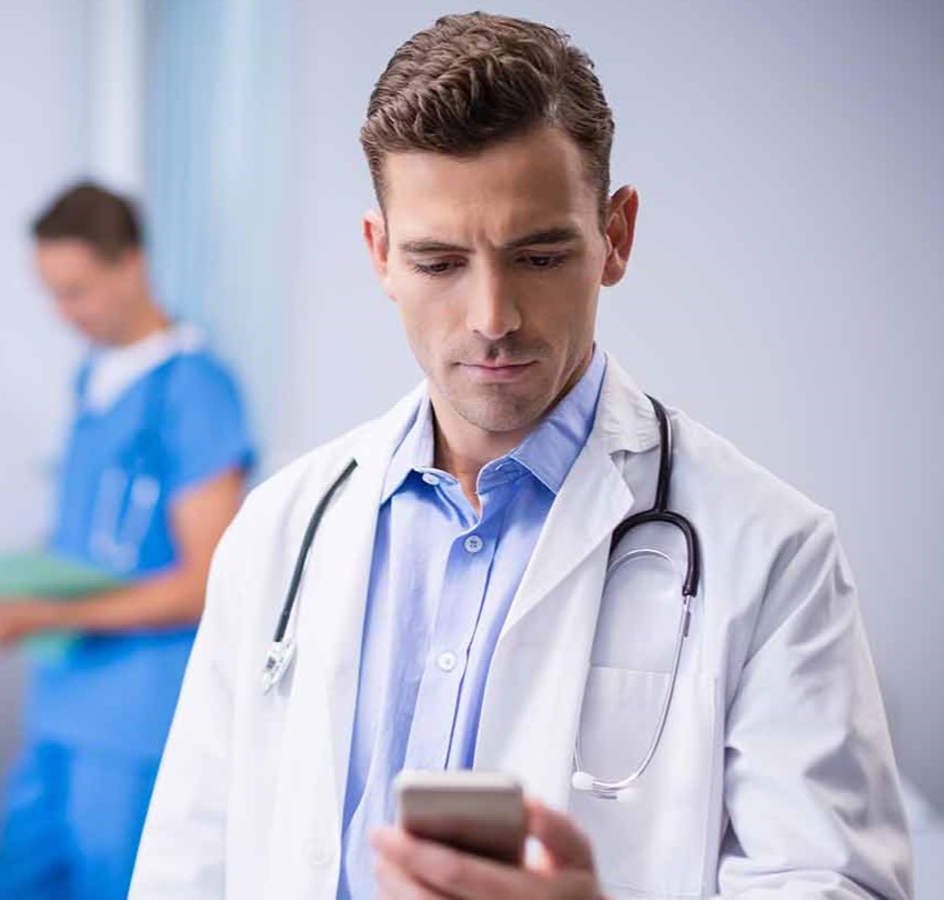 Doctor using mobile phone